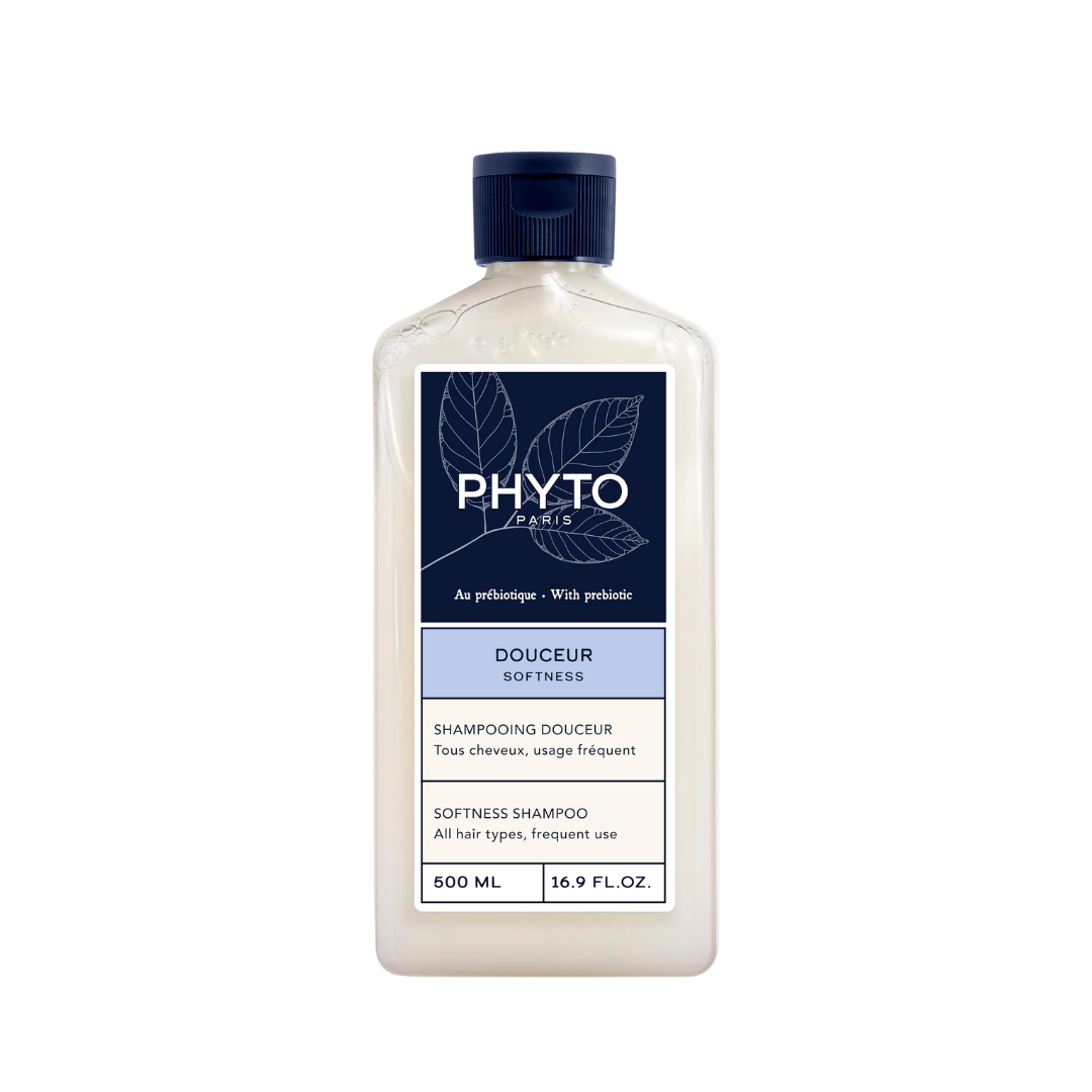 PHYTO Douceur Softness Shampoo, 500ml translucent bottle with navy cap and blue label.