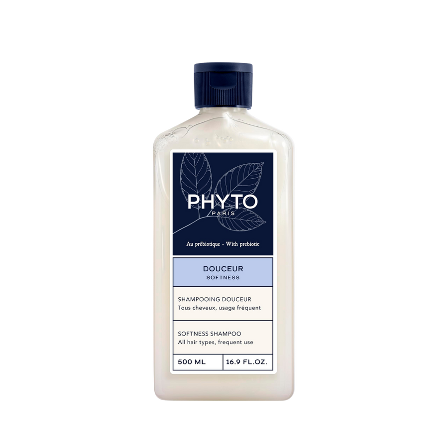 PHYTO Douceur Softness Shampoo, 500ml translucent bottle with navy cap and blue label.