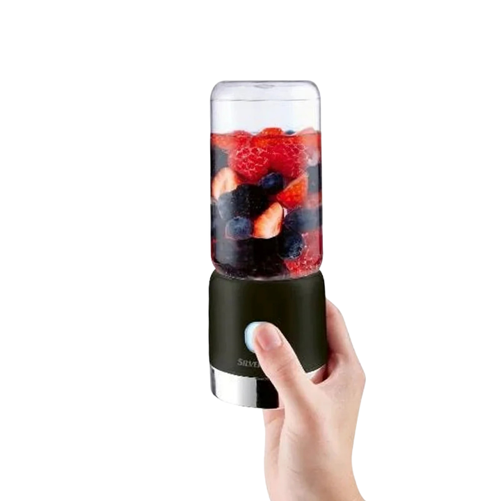SilverCrest portable smoothie maker with black base, clear blending cup, and visible mixed berries
