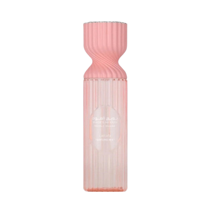 Lattafa Noble Oud Perfume Mist, with a pink, fluted bottle.