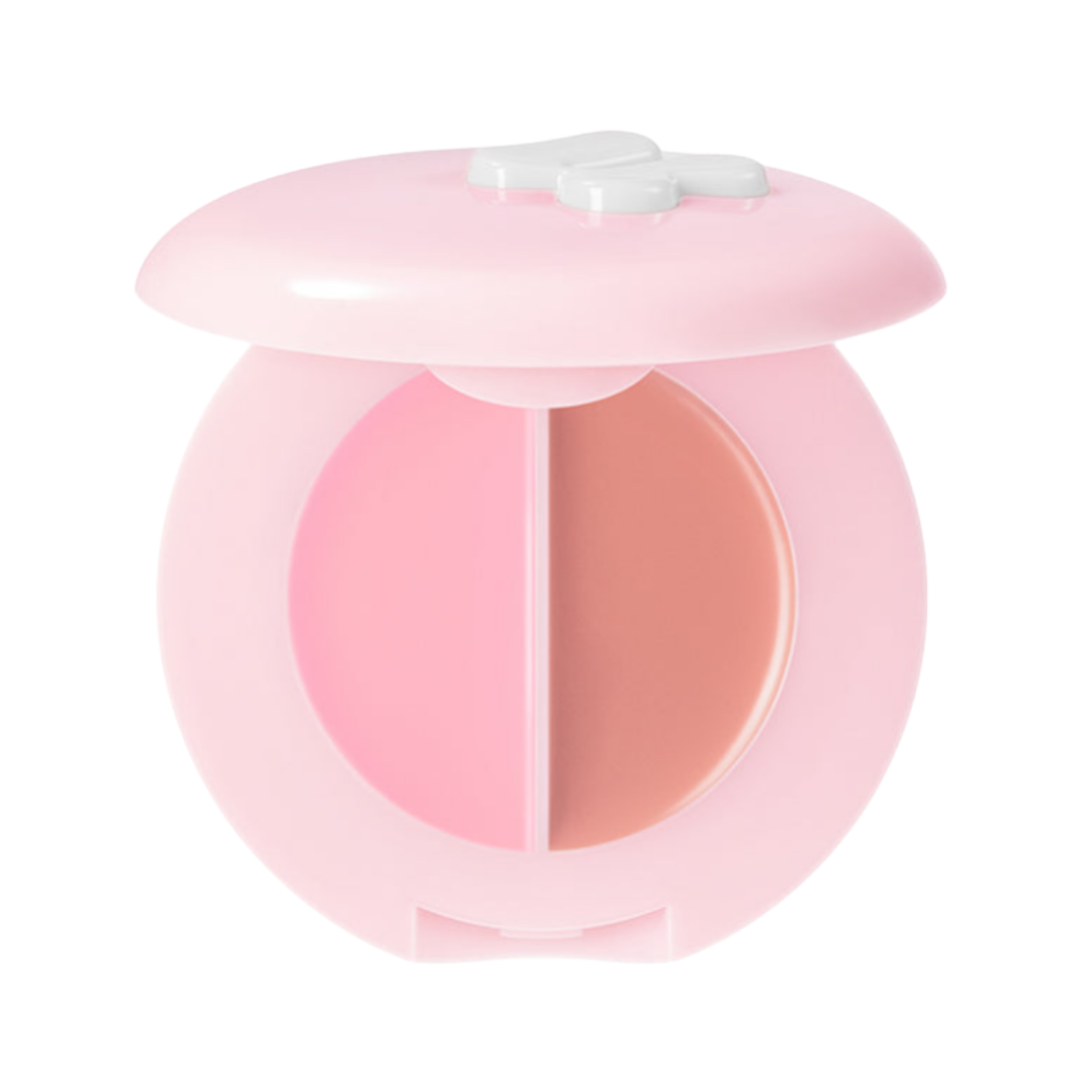Pink heart-shaped makeup compact with two-tone blush palette and butterfly-style lid design.