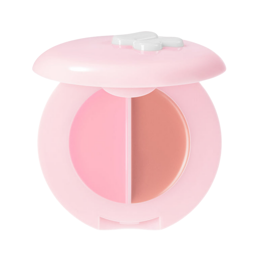 Pink heart-shaped makeup compact with two-tone blush palette and butterfly-style lid design.