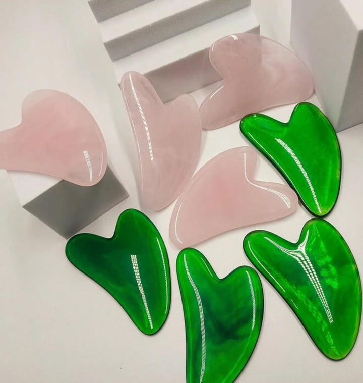 One facial massage tool green and pink| أداة تدليك الوجه الطبيعية