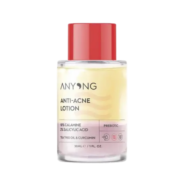 ANYONG Anti-Acne Lotion 30ml – transparent bottle with red cap, labeled with key ingredients: 10% Calamine, 2% Salicylic Acid, Tea Tree Oil, and Curcumin.