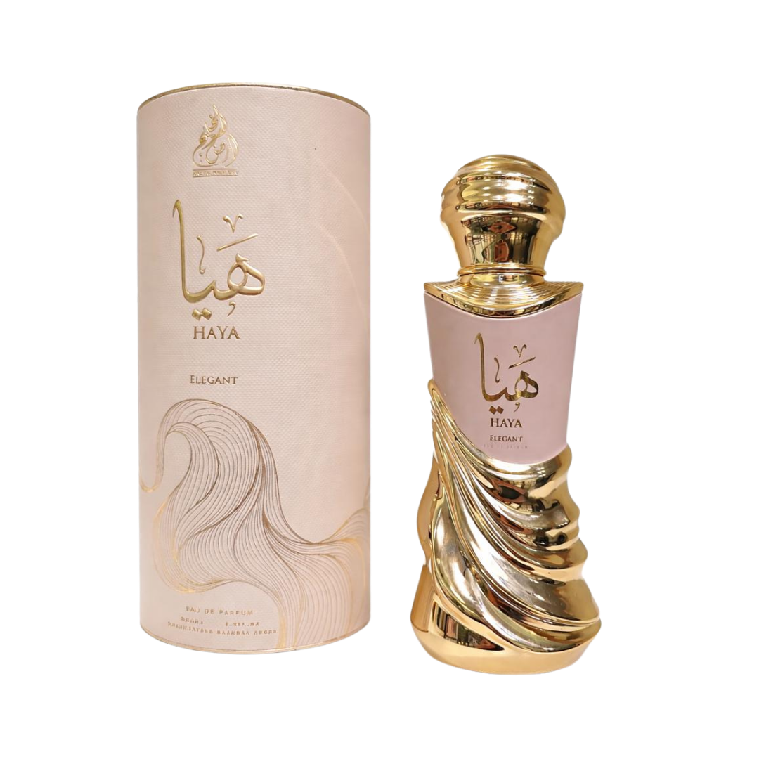 Ard Al Zaafaran Haya Elegant eau de parfum bottle with gold cap and pink cylindrical box