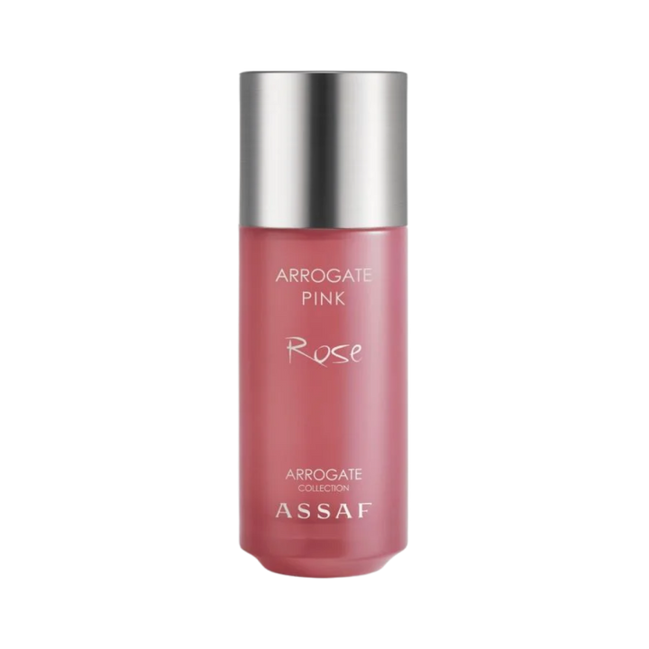 ASSAF Arrogate Pink Rose body spray bottle, pink cylindrical container with silver cap, labeled Arrogate Collection