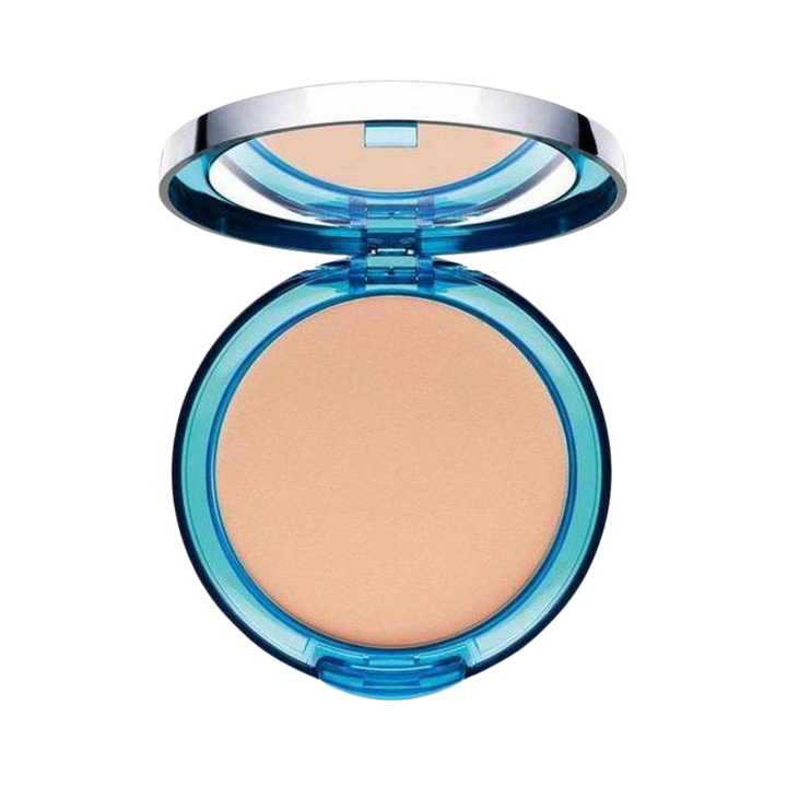 ARTDECO compact powder in beige, inside a blue circular compact with a mirror and silver lid.