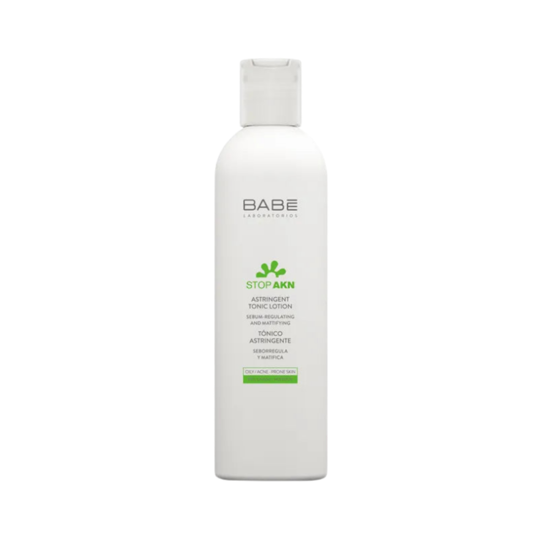 BABÉ Laboratorios Stop AKN Astringent Tonic Lotion, sebum-regulating and mattifying toner for oily and acne-prone skin, in white bottle.