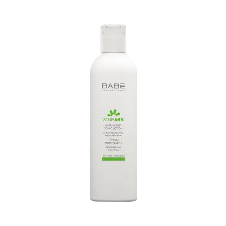 BABÉ Laboratorios Stop AKN Astringent Tonic Lotion, sebum-regulating and mattifying toner for oily and acne-prone skin, in white bottle.
