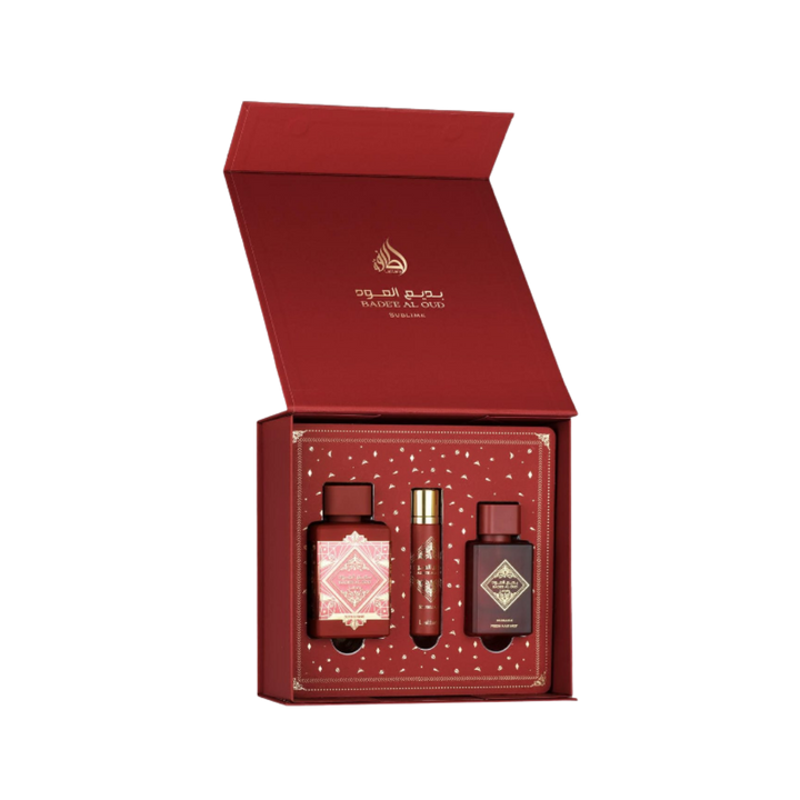 Badiee Al Oud Sublime set, includes two bottles of fragrance and a roll-on, all housed in a luxurious red box.