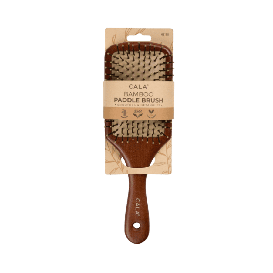 CALA bamboo paddle hairbrush with brown wooden handle, cushioned base, green-tipped bristles, and cardboard packaging.