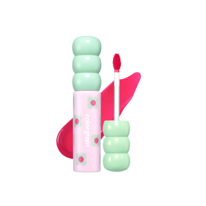 Colorgram liquid lipstick, pink cylindrical tube with stacked mint green cap, applicator wand shown, bright pink swatch behind, printed text branding, 656x601px 