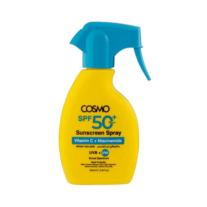 COSMO SPF 50+ sunscreen spray 200ml yellow bottle with blue trigger, Vitamin C and Niacinamide label.