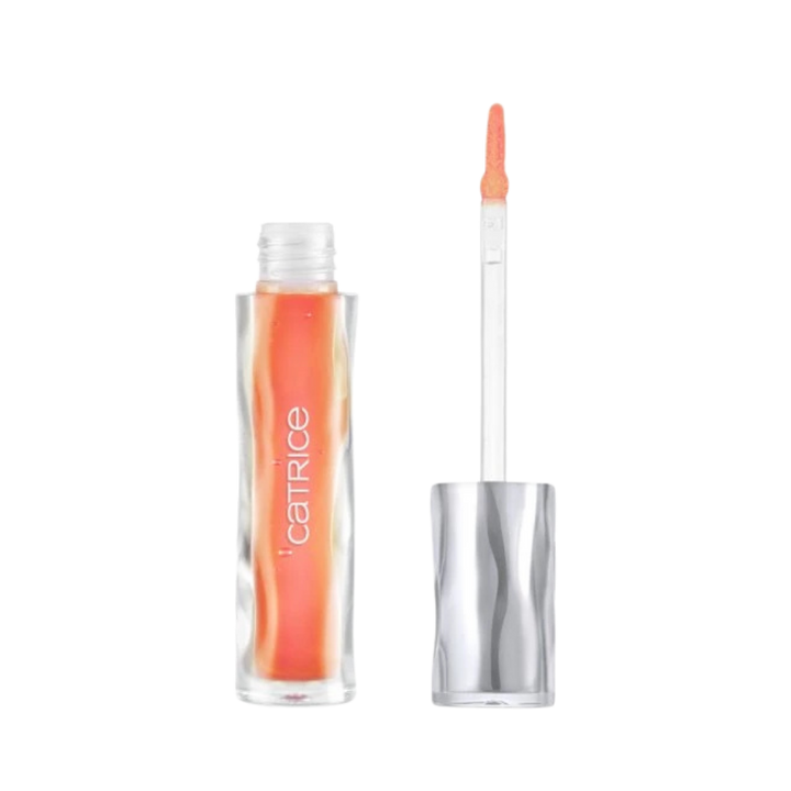 Catrice lip gloss tube with silver cap and wand applicator coral shade liquid cosmetic product