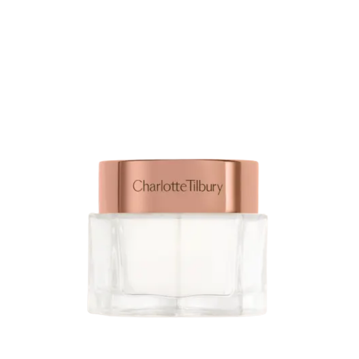 Charlotte Tilbury Magic Cream 30ml facial moisturizer in a clear faceted jar with burgundy lid.