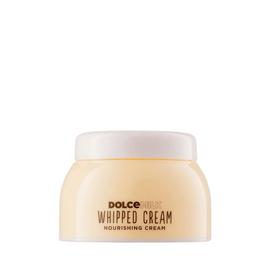 DOLCE MILK Whipped Cream nourishing cream, pale yellow jar with white lid and brown text