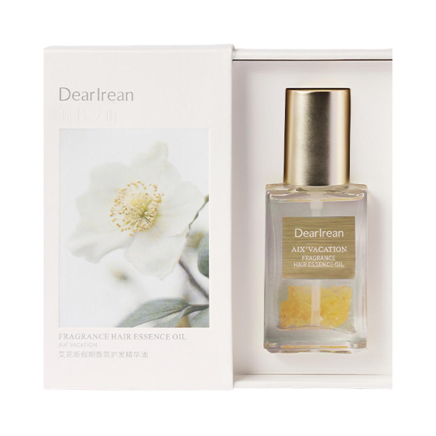 Dearreian AIX Vacation Fragrance Hair Essence Oil, clear bottle with gold cap, floral packaging, for hair nourishment and fragrance.
