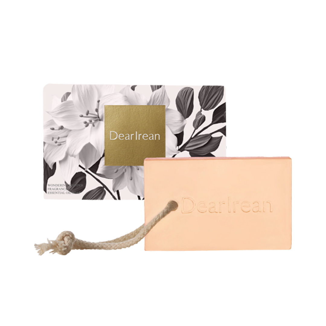 Dearreian Wonder Fragrance Soap, pink soap bar with embossed logo, packaged in a floral box with a gold label.
