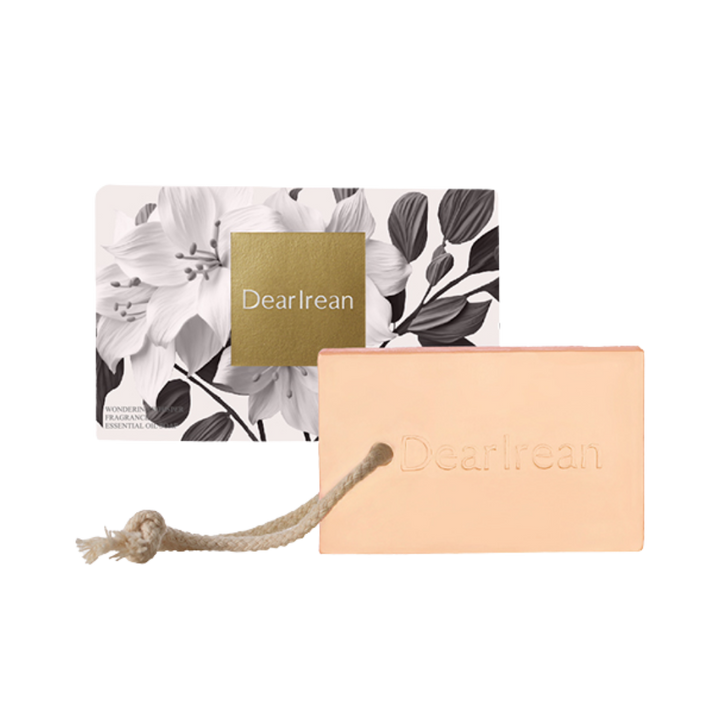 Dearreian Wonder Fragrance Soap, pink soap bar with embossed logo, packaged in a floral box with a gold label.
