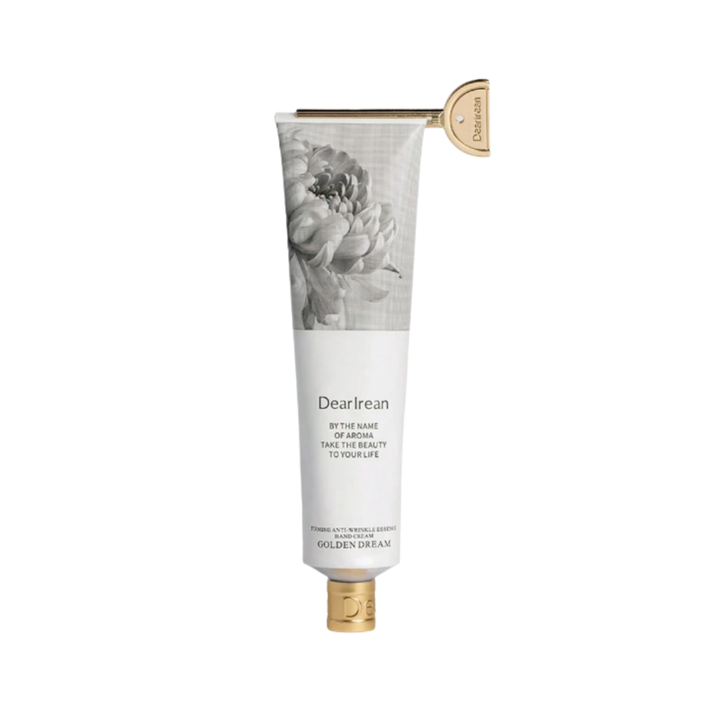 Dearreian Golden Dream Anti-Wrinkle Essence, white tube with floral design, gold cap, for skincare.
