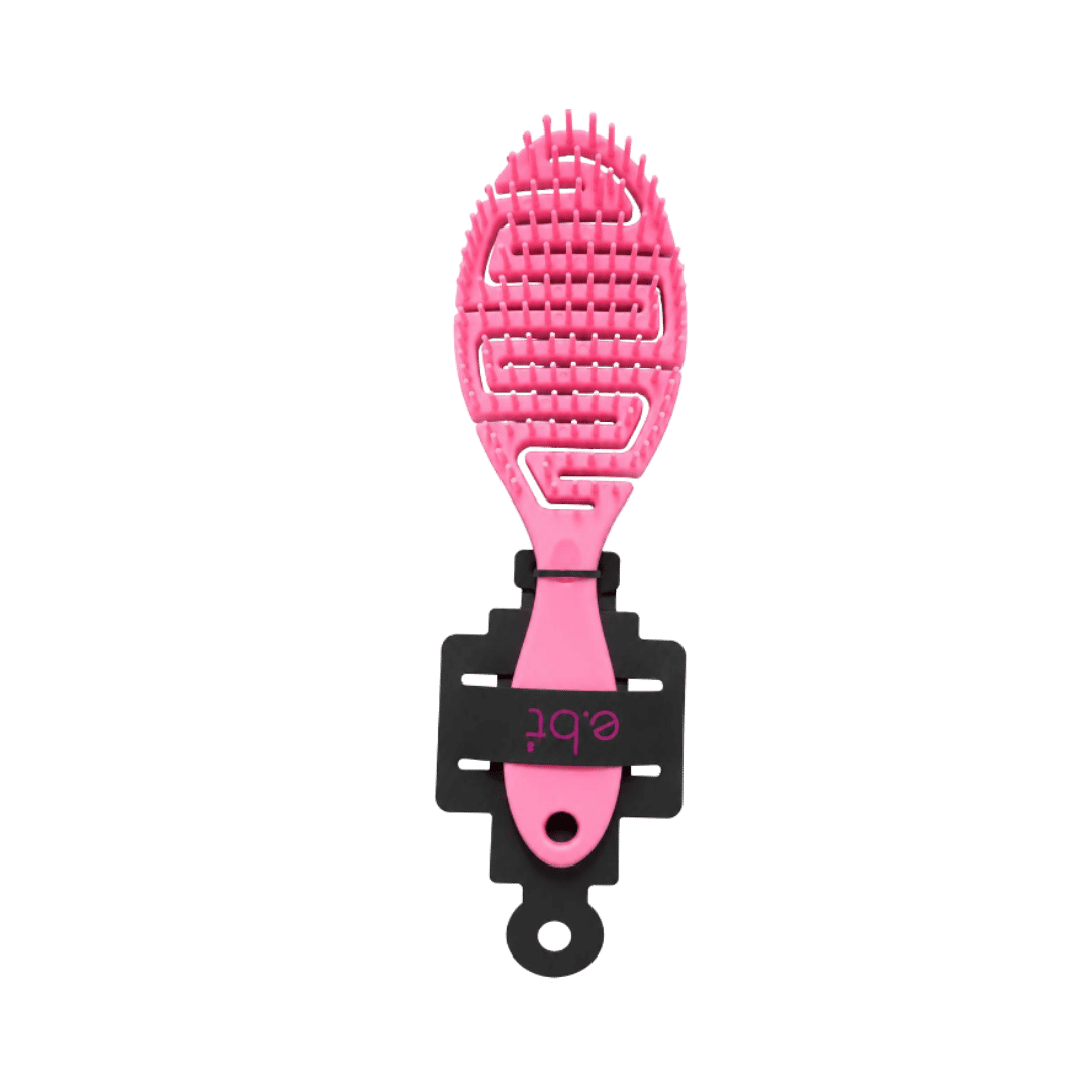 Pink vented detangling hair brush with flexible bristles, curved design, black holder, and hanging handle.