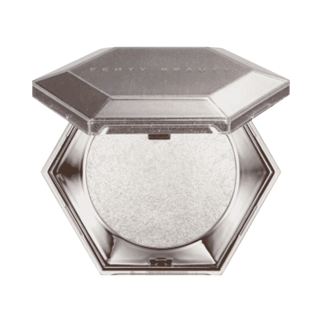 Fenty Beauty Diamond Bomb highlighter in silver hexagonal compact with open lid and white shimmer pan