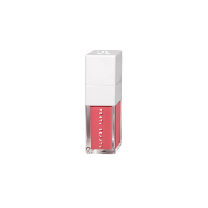 Fenty Beauty Shake ’N Play luminous liquid blush in coral-red shade, shown with white cap and box.