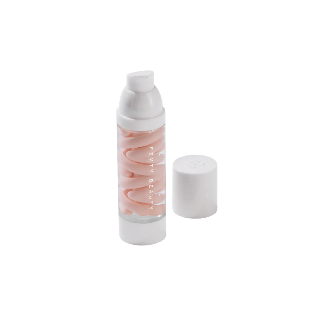 Fenty Beauty pink swirled cosmetic bottle with white pump dispenser and separate white cap