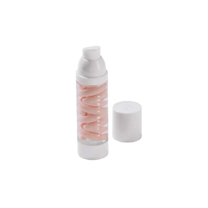 Fenty Beauty pink swirled cosmetic bottle with white pump dispenser and separate white cap