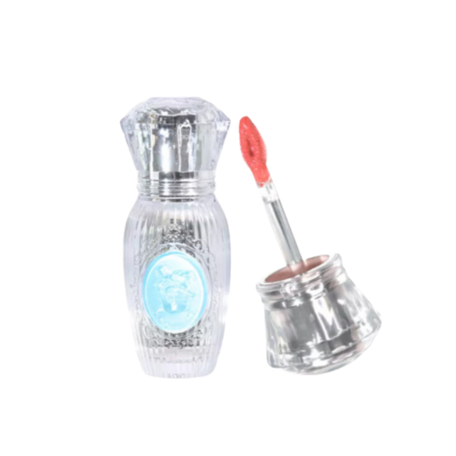 Clear decorative lip gloss bottle with blue oval label and coral-tinted doe-foot applicator.