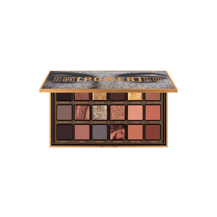 Huda Beauty Empowered eyeshadow palette with open gold compact and eighteen neutral shimmer shades