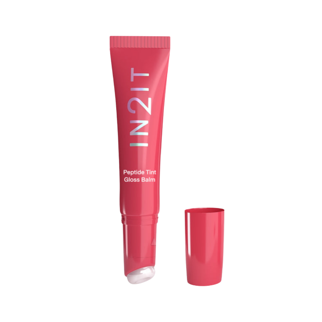 IN2IT Peptide Tint Gloss Balm lip gloss balm in a red-pink tube with squeeze applicator and matching cap.