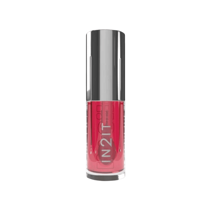 IN2IT lip oil tube with pink tinted formula and reflective silver cap packaging