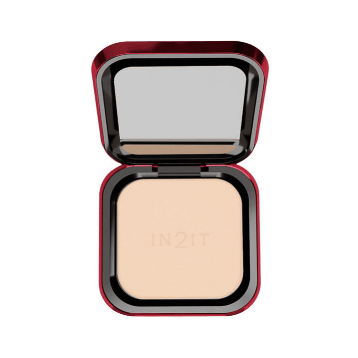 IN2IT pressed powder compact with mirror and beige powder in red square makeup case