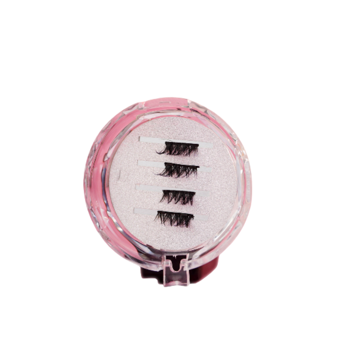 Round eyelash case with multiple false eyelashes, reusable lash strips in clear compact packaging.