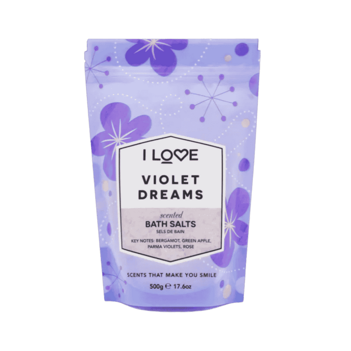 I Love Violet Dreams scented bath salts, 500 g, purple floral resealable pouch with white label.