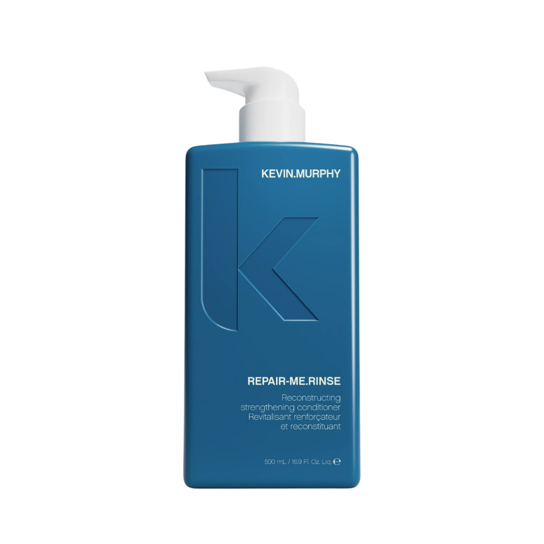 Kevin Murphy Repair-Me.Rinse reconstructing strengthening conditioner, 500ml, in a blue rectangular pump bottle.
