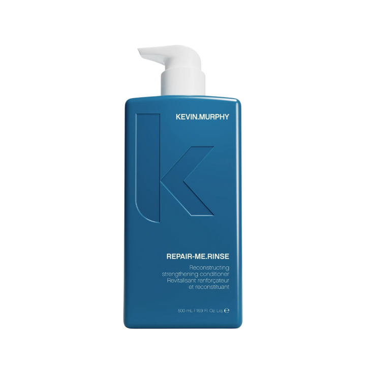Kevin Murphy Repair-Me.Rinse reconstructing strengthening conditioner, 500ml, in a blue rectangular pump bottle.