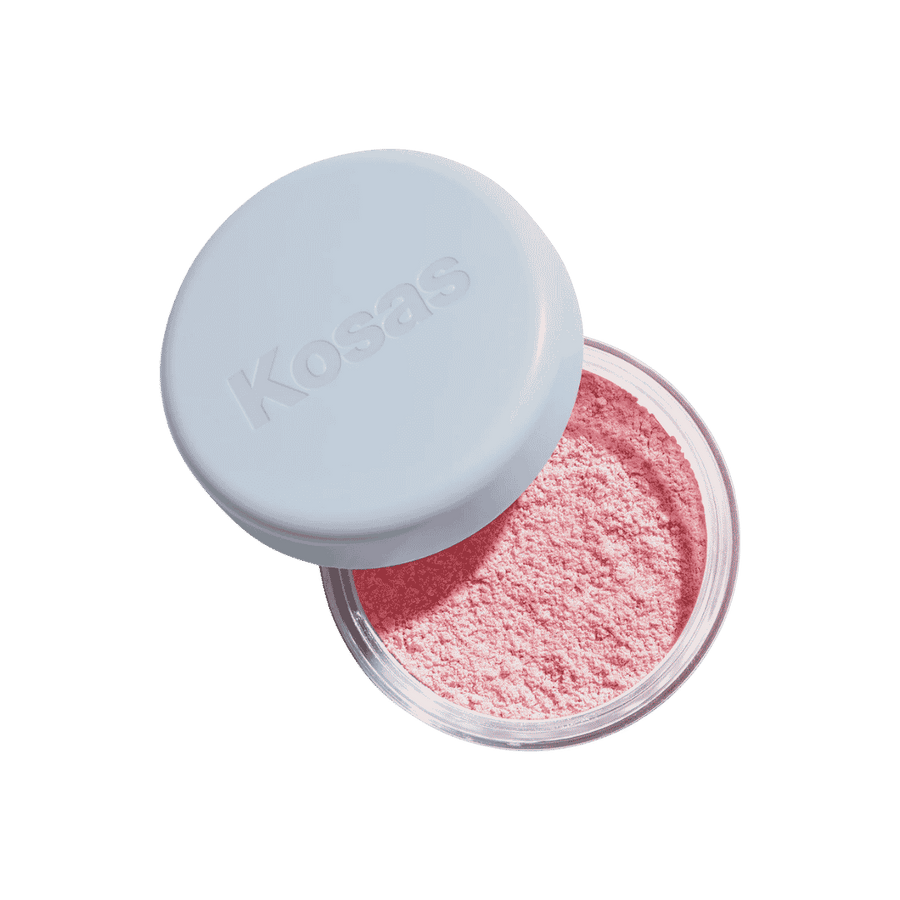 Kosas pink loose setting powder in clear jar with pale blue embossed lid