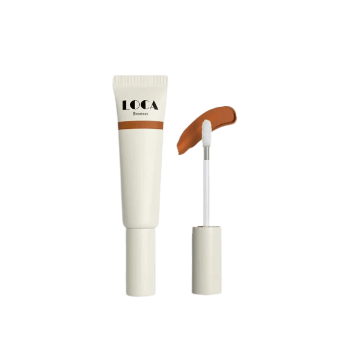 LOCA Bronzer cream in beige tube with doe-foot applicator and warm brown swatch