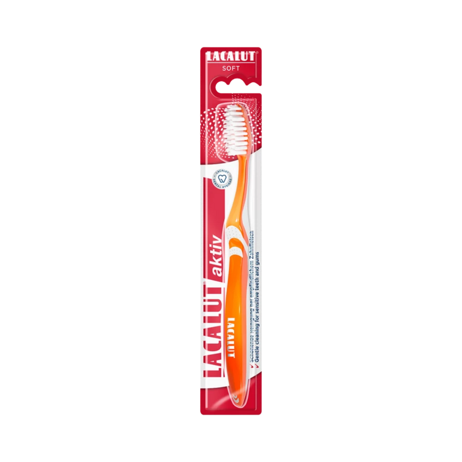 Lacalut Aktiv soft toothbrush with orange handle, soft white bristles, single toothbrush in red blister packaging