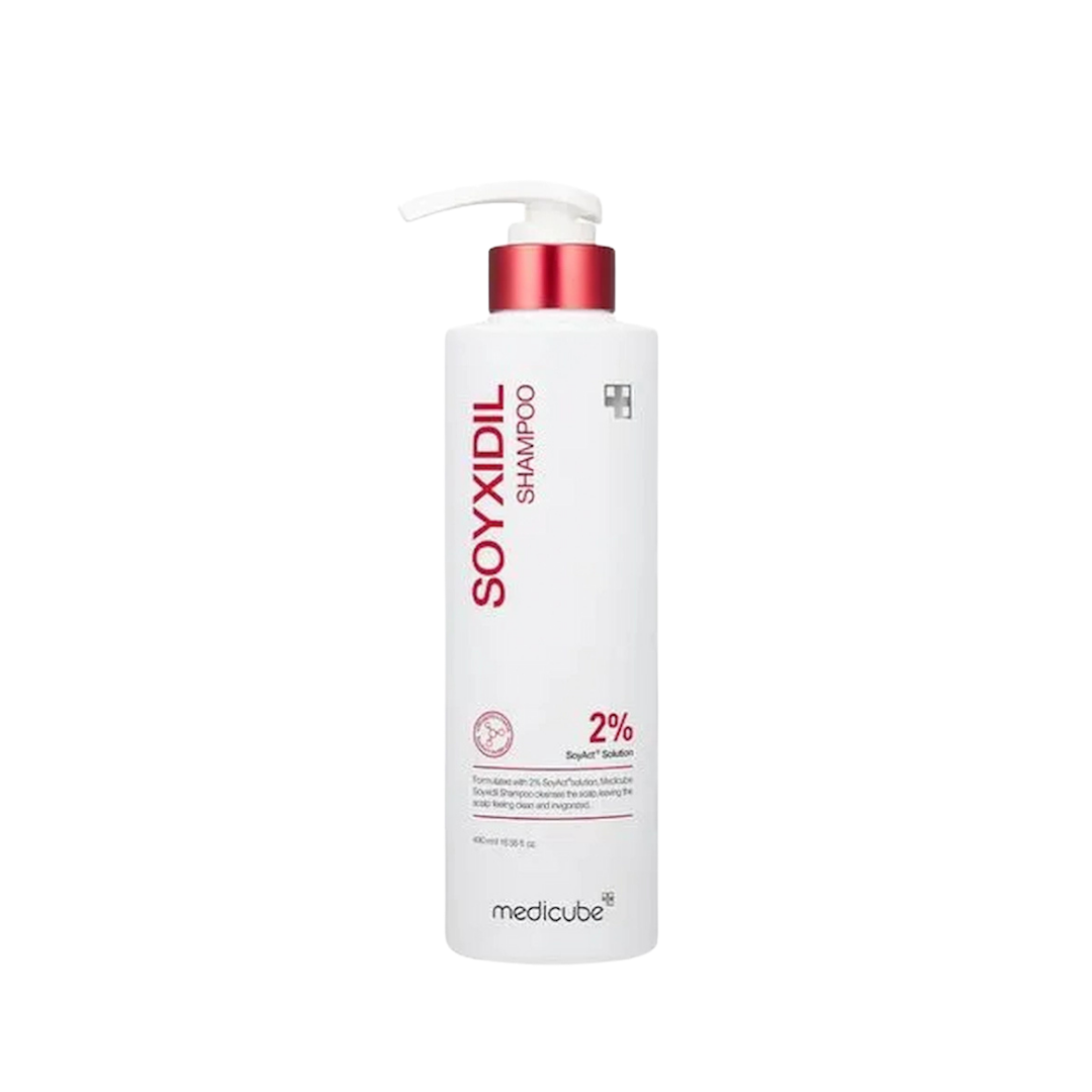 Medicube Soyxidil strengthening shampoo, 490ml, in a tall white pump bottle with red metallic collar.