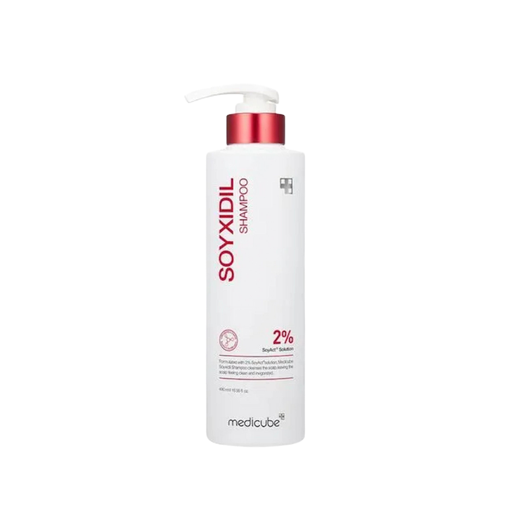 Medicube Soyxidil strengthening shampoo, 490ml, in a tall white pump bottle with red metallic collar.