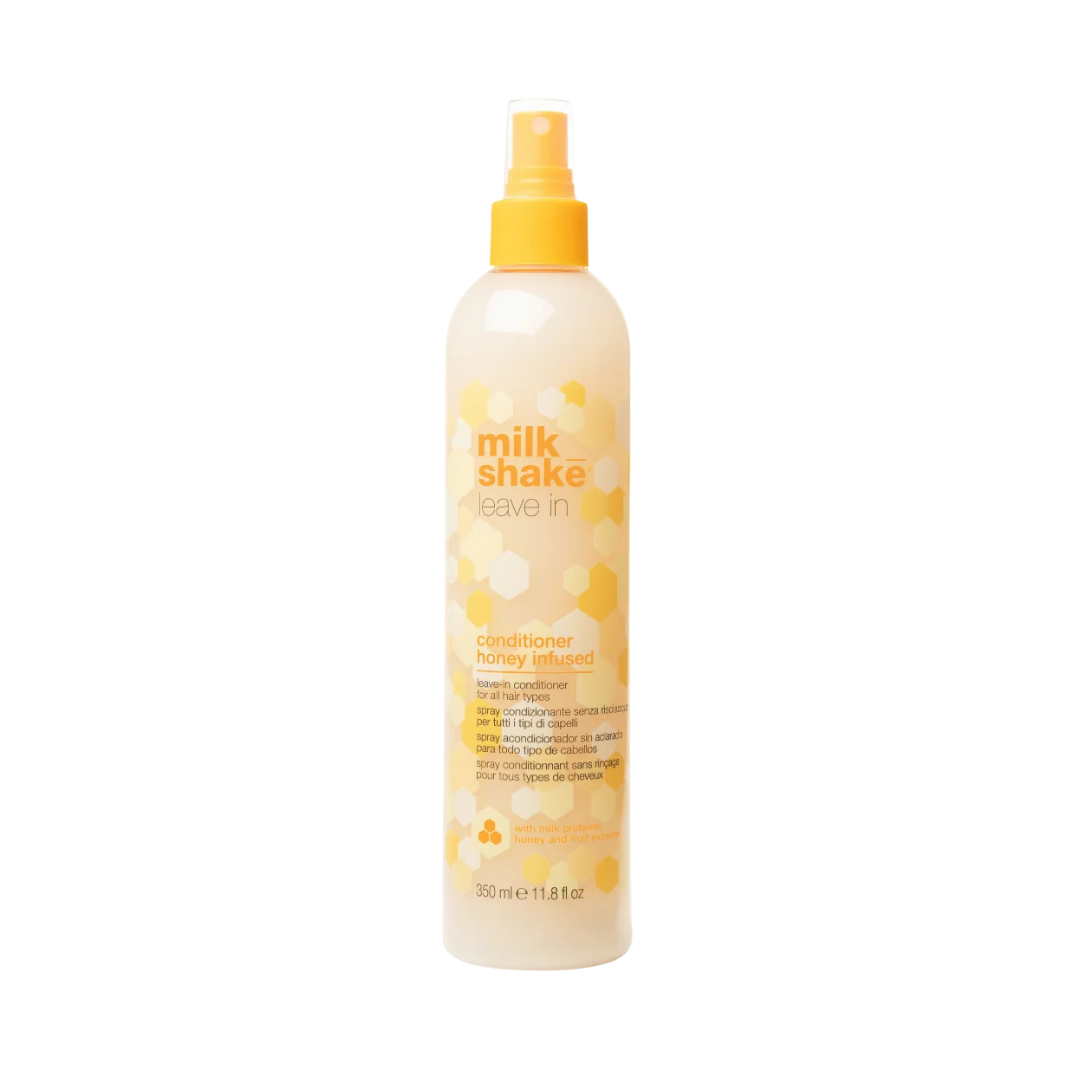 Milk_Shake Honey Infused Leave-In Conditioner 350 ml bottle with spray dispenser and yellow product label.