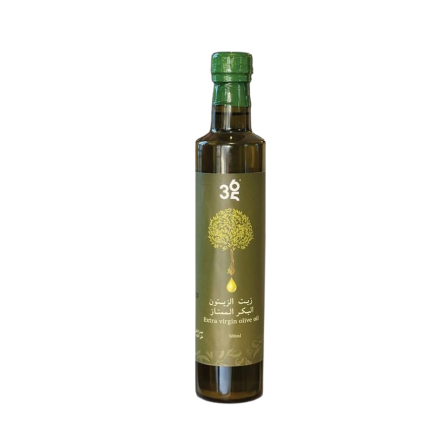 Extra virgin olive oil, 500ml, in a glass bottle with a green cap, labeled with Arabic and English text.
