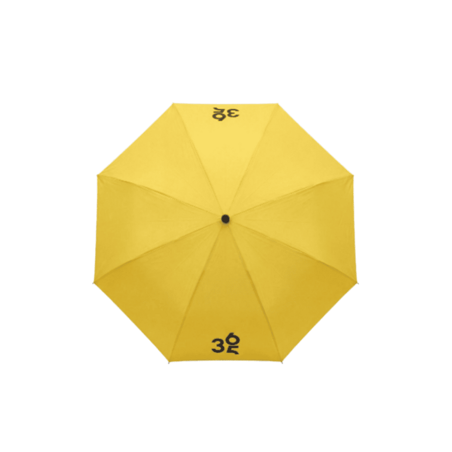Yellow umbrella with black center tip and small black logo printed on canopy
