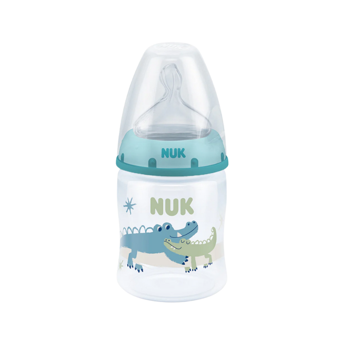 NUK baby bottle, 150 ml, clear bottle with turquoise ring, silicone nipple, crocodile print design
