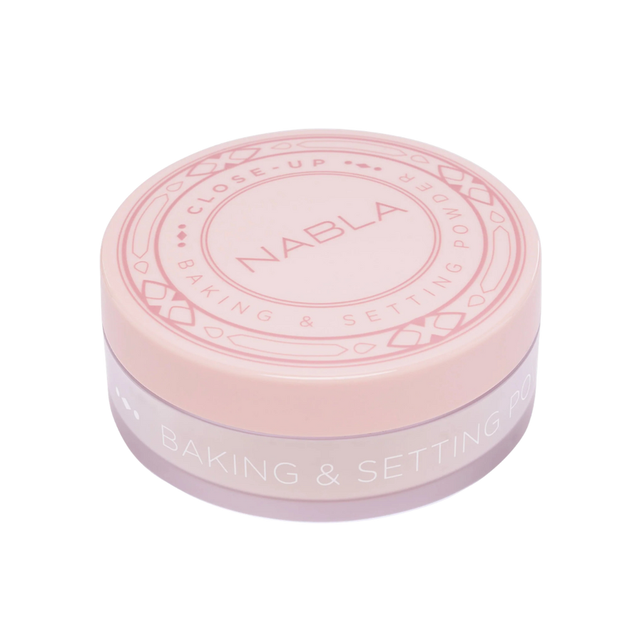 NABLA Close-Up Baking & Setting Powder in soft pink round container for makeup setting and baking.