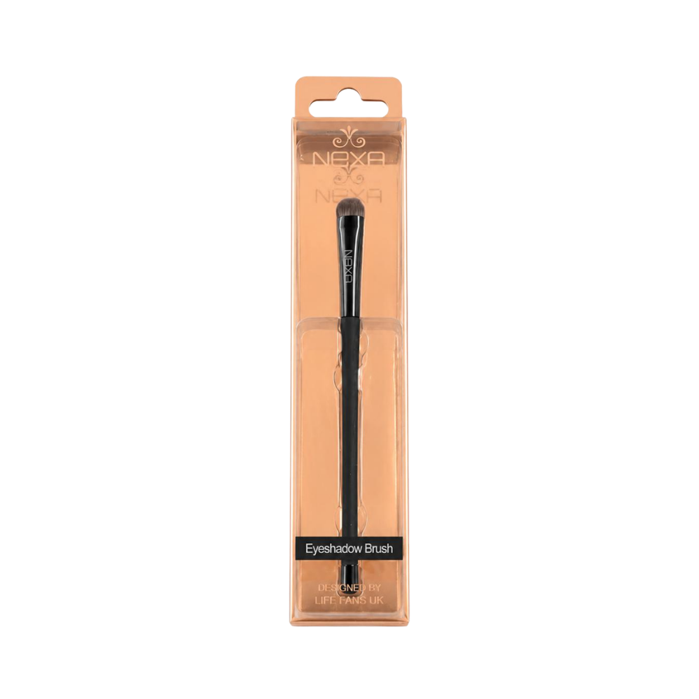 NEXA eyeshadow brush with black handle, rounded gray bristles, and transparent peach-colored retail packaging.