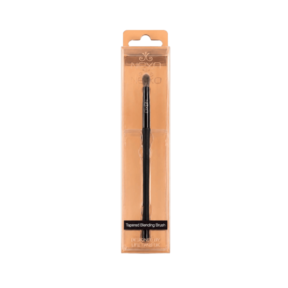 Nexo tapered blending brush with black handle and soft gray bristles in clear peach retail packaging.